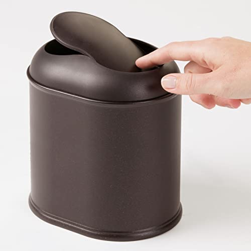 mDesign Modern Plastic Mini Wastebasket Trash Can Dispenser with Swing Lid for Bathroom Vanity Countertop or Tabletop - Dispose of Cotton Rounds, Makeup Sponges, Tissues - Bronze