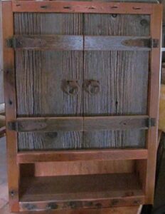 barn wood over toilet cabinet