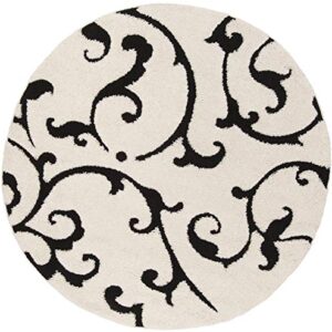 SAFAVIEH Florida Shag Collection Area Rug - 6'7" Round, Ivory & Black, Scroll Design, Non-Shedding & Easy Care, 1.2-inch Thick Ideal for High Traffic Areas in Living Room, Bedroom (SG476-1290)