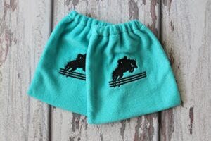 english stirrup covers, stirrup bag, equine iron covers, elastic closing, turquoise, embroidered jumping horse and rider