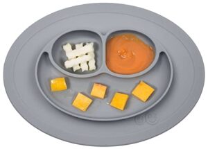 ezpz mini mat - 100% silicone suction plate with built-in placemat for infants + toddlers - first foods + self-feeding - comes with a reusable travel bag (gray)