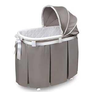 Wishes Oval Rocking Baby Bassinet with Bedding, Storage, and Pad