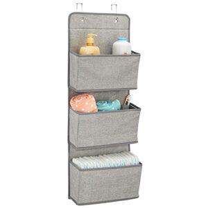 mdesign fabric baby nursery hanging organizers for over the door storage for kids - 3 pocket organizer caddy with hooks for clothing, school, diaper, toy, outfits - lido collection - textured - gray