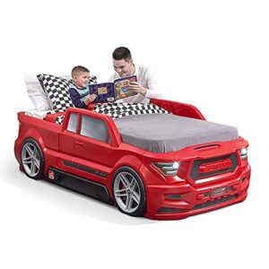 step2 turbocharged twin size truck car bed – vibrant red realistic truck toddler bed with tires, rims, decals, and working headlights – built-in storage – truck-themed twin-size bed