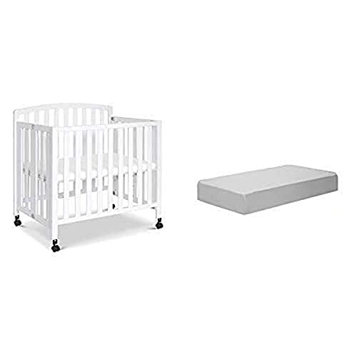 DaVinci Dylan Folding Portable Three-in-one Mini Crib and Twin Bed in White with Complete Slumber Mini Crib Mattress