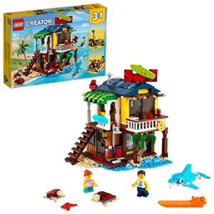 lego creator 3-in-1 surfer beach house 31118 - featuring lighthouse, pool house, boat, 2 minifigures, dolphin figure, great summer building toy set for kids, girls, and boys ages 8+