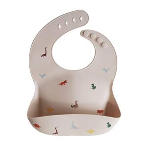 mushie silicone baby bib | adjustable fit waterproof bibs (dinosaurs)