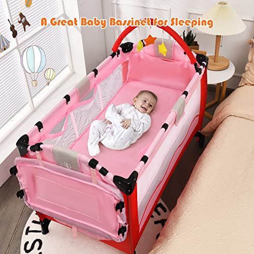 BABY JOY 4 in 1 Pack and Play, Portable Baby Playard with Bassinet, Changing Table w/Safety Belt, Zippered Door, Hanging Toys, Baby Pink Bassinet & Cribs Activity Center from Newborn to Toddler (Pink)