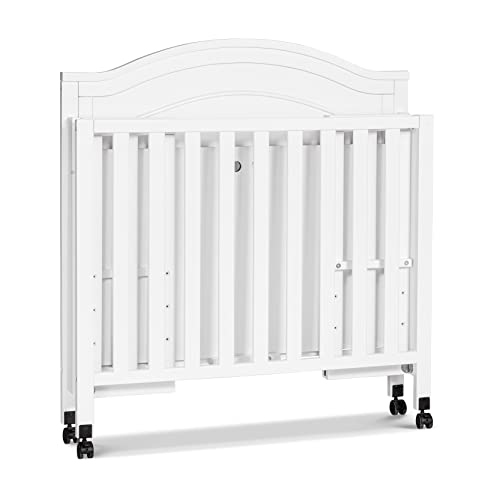 DaVinci Charlie Folding Portable 3-in-1 Convertible Mini Crib and Twin Bed in White, Removable Wheels, Greenguard Gold Certified