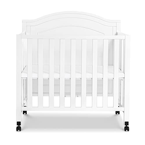 DaVinci Charlie Folding Portable 3-in-1 Convertible Mini Crib and Twin Bed in White, Removable Wheels, Greenguard Gold Certified