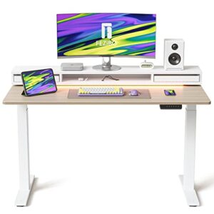 fezibo 55 × 26 inch electric standing desk with monitor stand, height adjustable table with led strips, ergonomic home office furniture with 2 drawers storage gaming workstation, light walnut top