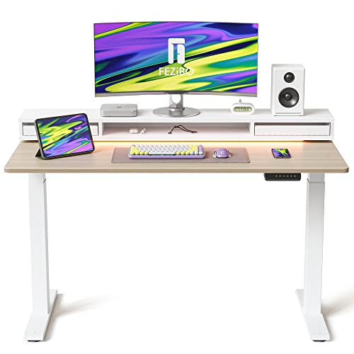 FEZIBO 55 × 26 Inch Electric Standing Desk with Monitor Stand, Height Adjustable Table with LED Strips, Ergonomic Home Office Furniture with 2 Drawers Storage Gaming Workstation, Light Walnut Top