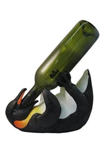 playful antarctic penguin wine bottle holder by dwk | tabletop south pole decor and centerpiece