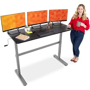 stand steady tranzendesk 55 inch standing desk | easy crank height adjustable sit to stand workstation | modern ergonomic desk supports 3 monitors | great for home & office! (black top/silver frame)
