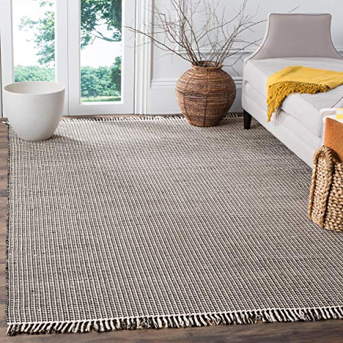 SAFAVIEH Montauk Collection Area Rug - 5' x 8', Ivory & Black, Handmade Flat Weave Boho Farmhouse Cotton Tassel Fringe, Ideal for High Traffic Areas in Living Room, Bedroom (MTK340D)