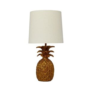 creative co-op resin pineapple table lamp with linen shade, distressed gold