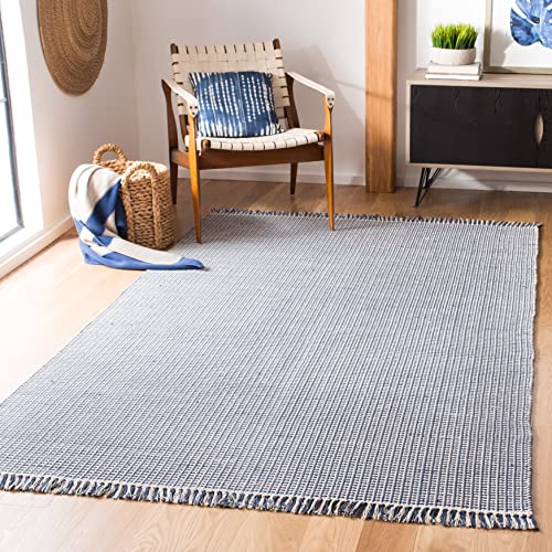 SAFAVIEH Montauk Collection Area Rug - 6' x 9', Ivory & Black, Handmade Flat Weave Boho Farmhouse Cotton Tassel Fringe, Ideal for High Traffic Areas in Living Room, Bedroom (MTK340D)