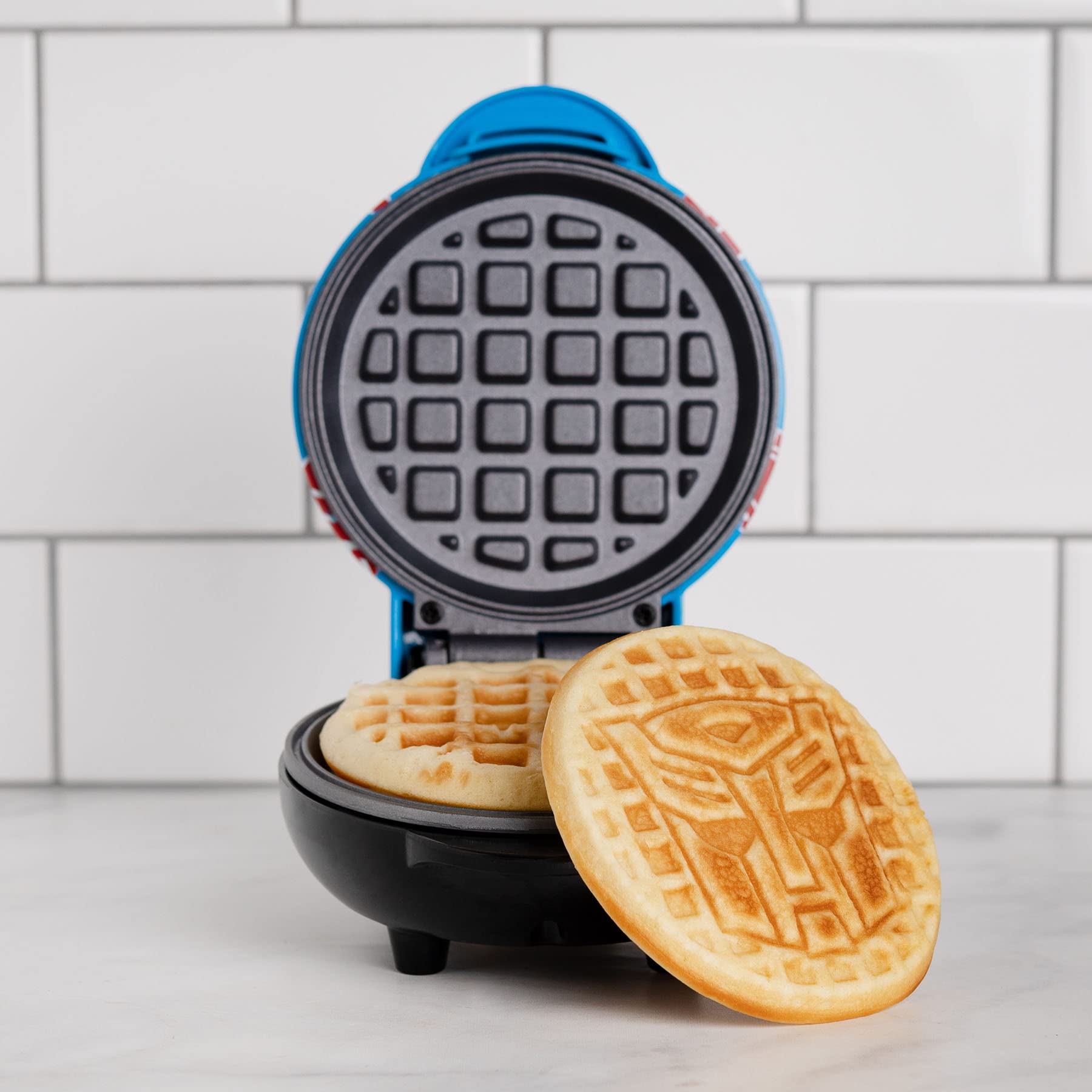 Uncanny Brands Autobot Mini Waffle Maker - Transformers Kitchen Appliance