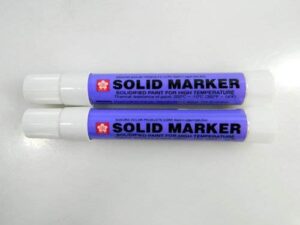 two (2) sakura solid paint marker white