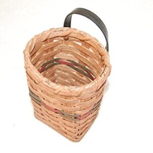 Hand Woven Utensil Wall Hanging Basket. This Cute Basket Is Handmade Locally Here in Ohio By the Local Amish. It Is a Very Handy Basket That Allows You to Store Your Utensils in a Basket on the Wall Saving Space on Your Counters. Measures: 4" X 3" X 8" Ta