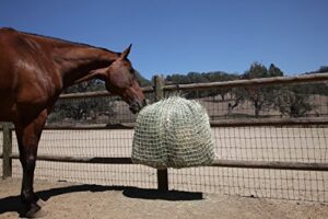 freedom feeder mesh net full day slow horse feeder — designed to hold 30 lbs/4 flakes of hay and feed horse all day — reduces horse feeding anxiety and behavioral issues
