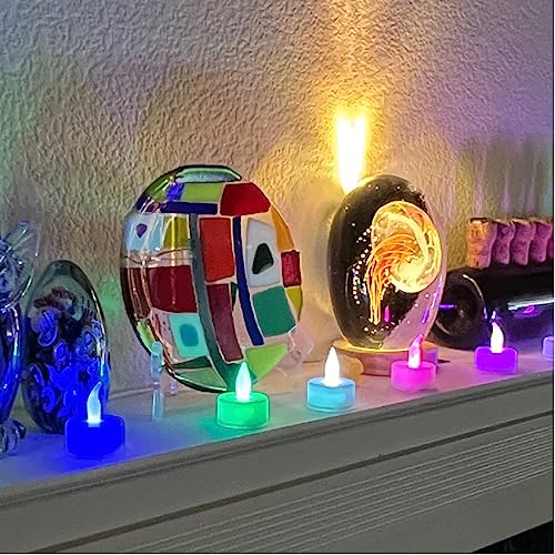 Lily's Home Color Changing Tea Lights Candles - Battery Operated LED Flameless Candles with Seven Rainbow Colors for Halloween Decorations, Electric Votive Candles. White Base. (Set of 12)