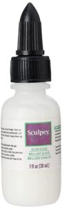 sculpey® gloss glaze, non toxic, 1 fl oz. bottle with precise flow twist cap. will add a glossy finish to your baked polymer oven-bake clay creations!
