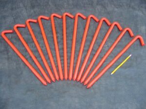 a 12 pack of 18" long metal hook stakes.coated in safety orange baked on enamel