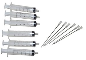 opt. 6 syringes with long needles for refilling refillable cartridges and continuous ink supply system ciss from new york.