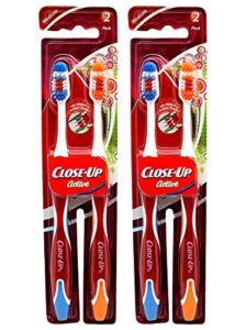 close-up toothbrush med. active 2-2 packs 4 brushes
