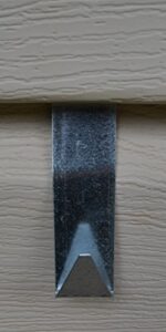 handcrafted siding hook 5 pk. these handmade galvanized siding house hook decor hangers are designed to be placed on a home that has siding without damaging it. this hook will hold about 15 pounds. it can be used to display your barn star or other decorat