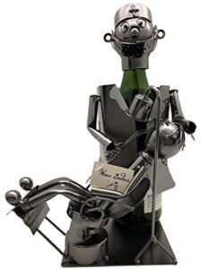 metal dentist with patient wine bottle holder character