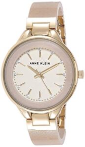 anne klein women's ak/1408crcr premium crystal accented cream bangle watch