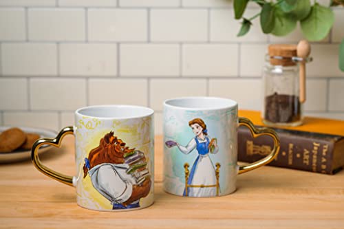 Silver Buffalo Disney Princess Beauty and the Beast Don't Mind the Books Gold Heart Shaped Handle 2 Pack Ceramic Mug Set, 14 Ounces