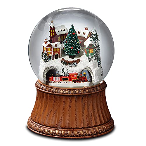 The San Francisco Music Box Company Rotating Train and Mountain Village Snow Globe