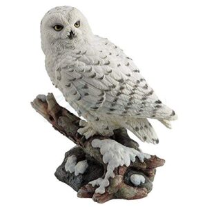 snow owl perching on branch figurine
