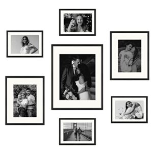 frametory, aluminum gallery wall frame set with ivory color mat - 7 pack of metal picture frames with real glass - four 5x7, two 8x10, one 11x14 - great for photos, artworks, posters (black)
