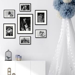 Frametory, Aluminum Gallery Wall Frame Set with Ivory Color Mat - 7 Pack of Metal Picture Frames with Real Glass - Four 5x7, Two 8x10, One 11x14 - Great for Photos, Artworks, Posters (Black)