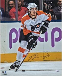 travis konecny philadelphia flyers autographed 16" x 20" vertical white jersey skating photograph - autographed nhl photos