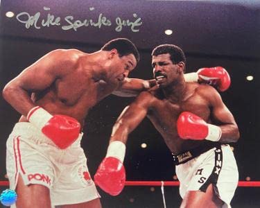 Michael Spinks signed Boxing Collage 8x10 Photo Jinx- AWM Hologram (vs Larry Holmes) - Autographed Boxing Photos