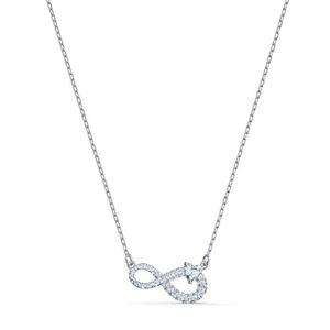 swarovski infinity pendant necklace with a white crystal heart set on crystal pavé infinity symbol on a rhodium plated chain