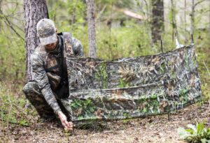 the grind knee blind, collapsible quick setup and take-down run-and-gun turkey blind, mossy oak bottomland camo