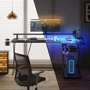 SEVEN WARRIOR L Shaped Gaming Desk with LED Lights & Power Outlets, 55” Reversible Corner Desk with Storage Shelf, Computer Desk with Monitor Stand, Gaming Table with Cup Holder, with Hooks, Black
