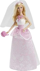 barbie bride doll in fairytale-inspired white and pink wedding dress with ring, veil and bouquet, blonde hair