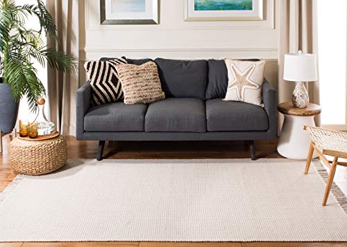 SAFAVIEH Montauk Collection Area Rug - 6' x 9', Ivory & Grey, Handmade Flat Weave Boho Farmhouse Cotton Tassel Fringe, Ideal for High Traffic Areas in Living Room, Bedroom (MTK340A)
