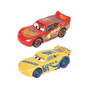Carrera First Disney/Pixar Cars 3 - Slot Car Race Track - Includes 2 cars: Lightning McQueen and Dinoco Cruz - Battery-Powered Beginner Racing Set for Kids Ages 3 Years and Up