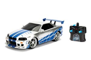 jada toys fast & furious brian's nissan skyline gt-r (bnr34)- ready to run r/c radio control toy vehicle, 1: 16 scale, silver and blue, (99370)