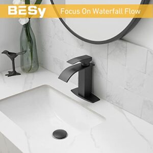 BESy Black Waterfall Spout Bathroom Faucet, Single Handle Bathroom Sink Faucet with Pop-up Drain, Rv Vanity Faucet with Deck Plate & Supply Hoses, Matte Black, 1 or 3 Hole