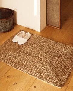 frelish decor handwoven jute area rug - 2x3 feet - natural yarn - rustic vintage beige braided reversible rug - eco friendly rugs for bedroom - kitchen - living room - farmhouse (2'x3')