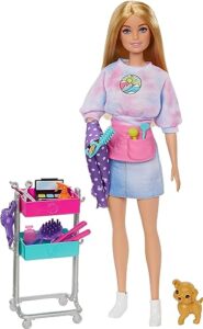 barbie on-set stylist doll & 14 accessories, blonde malibu fashion doll with cart, smock, makeup palette, puppy & more